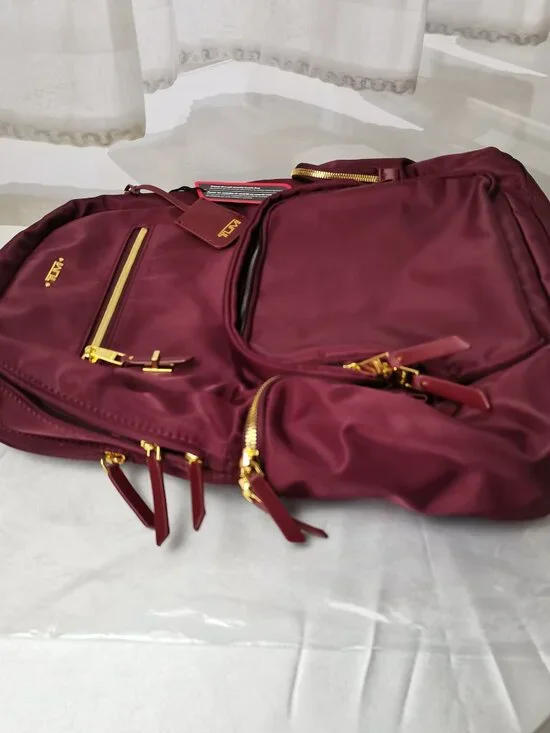 Tumi Burgundy Crossbody Backpack with Gold Hardware - Picture 5 of 10